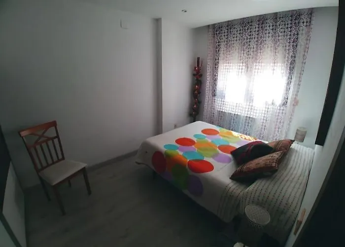 El Vinilo. Aparcamiento Exterior Gratuito